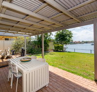 Lowset home on the canal - Dolphin Dr Bongaree - Adwords Guide
