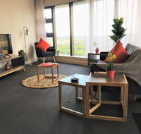 Stylish 2BR with Stunning Views - Sydney Olympic Park - Adwords Guide