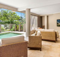 The Stanwell Beach Glass House - beach pool - Adwords Guide