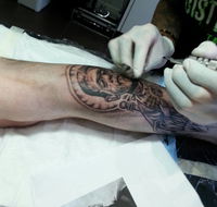 DistINKTion Tattoo - Adwords Guide