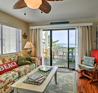 Condo with Large Oceanfront Deck and Captain Chairs