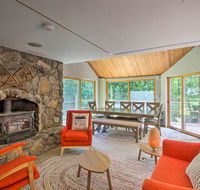 Elegant White Mountain Escape with Large Deck
